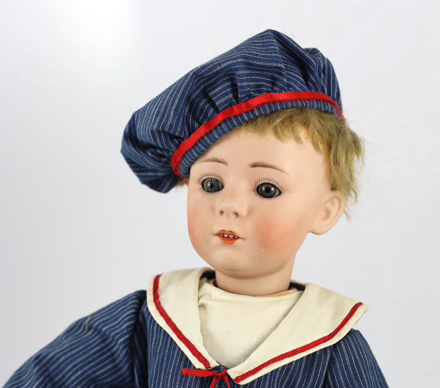 A Gebrüder Heubach bisque character doll, German, circa 1920, 20in.